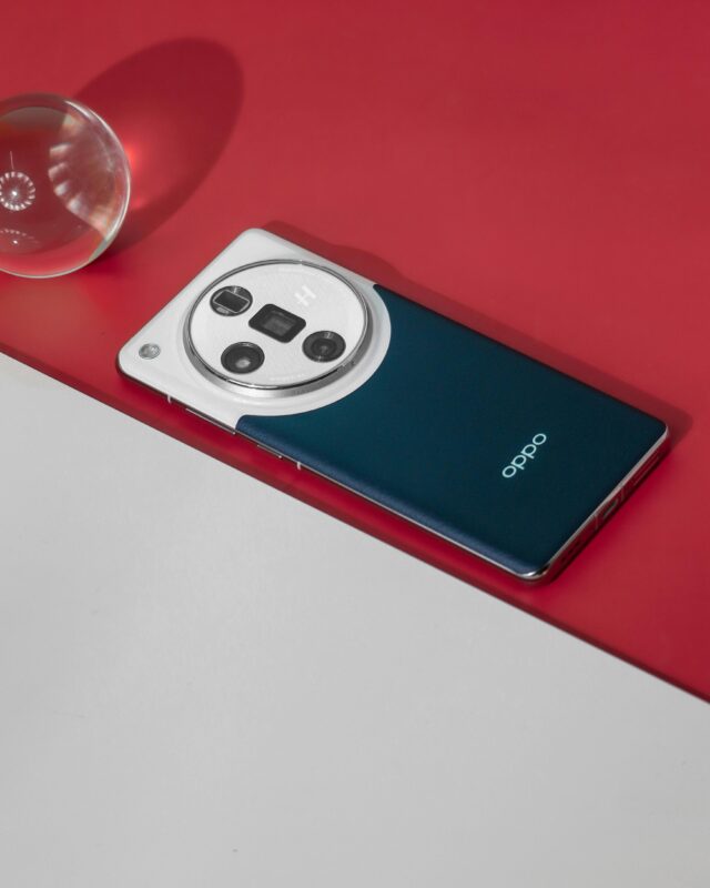 Vertical shot of an Oppo smartphone with advanced camera on stylish backdrop.